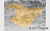 Satellite 3D Map of Bouira, desaturated