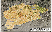 Satellite 3D Map of Guelma, darken, semi-desaturated